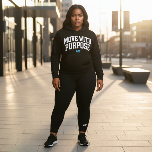 Model wearing the Motiv8Style Move With Purpose Hoodie, purpose-driven streetwear designed for discipline and intention.